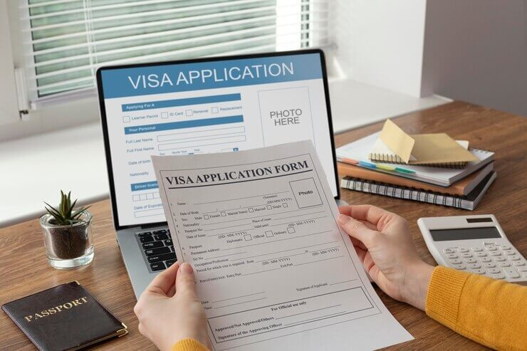 visa-application-form-laptop_23-2149117782 (1).jpg